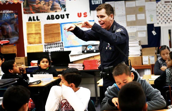 cop in classroom