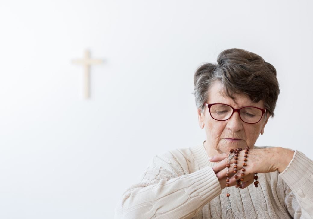 grandma praying alone PYAEGKP