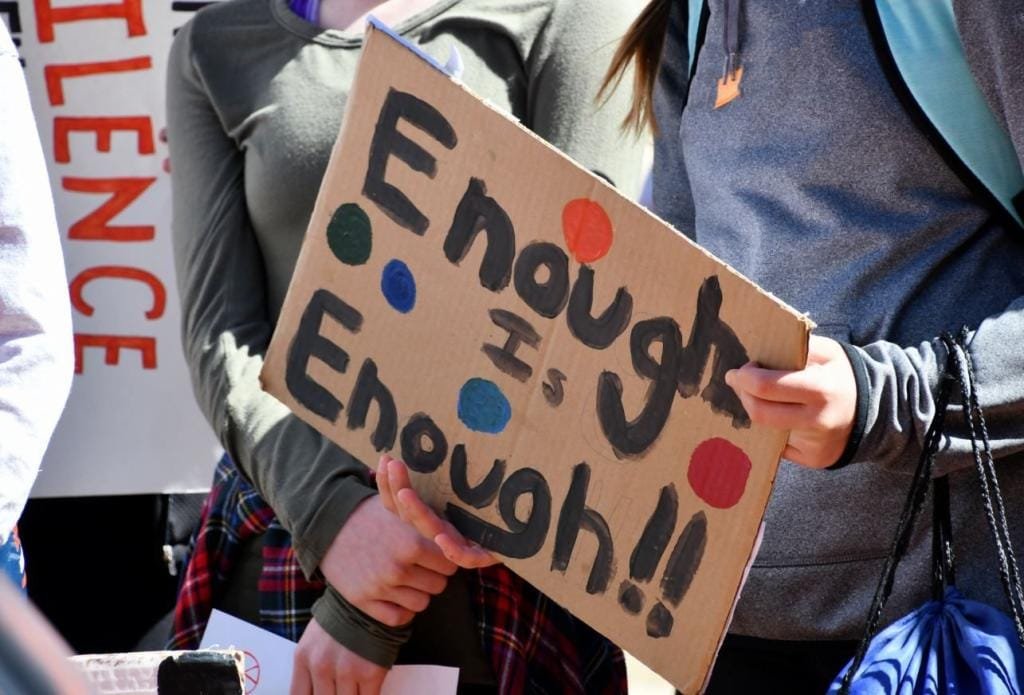 student protesters staging a walkout march due to school shootings and gun violence real people human t20 ro4EBw