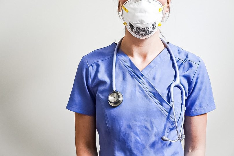 nursing school female healthcare worker wearing a protective face mask during the covid pandemic personal protective t20 6YpYl2