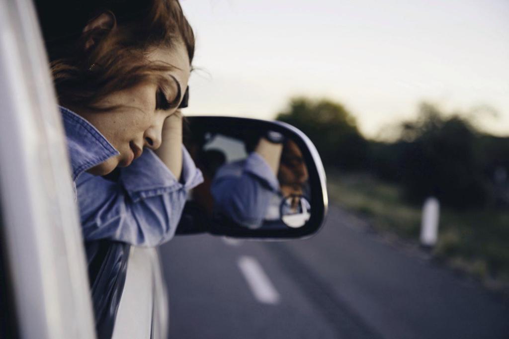 car travel adventure road trip woman reflecting sad thinking thinking daydreaming heartbreak t20 EPdvaK