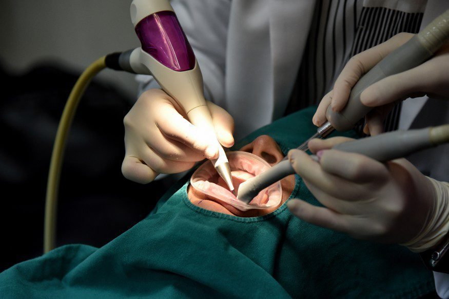 dental care check up dentist examining and doing teeth treatment in dental clinic yearly visit for t20 P1OBOB